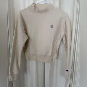 Champion Women's Cream Cropped Mock Neck Sweatshirt with Purple Logo